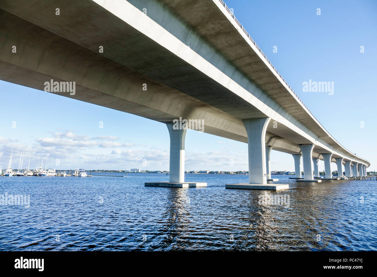 Stuart Florida,St. Saint Lucie River,Route 1 Federal Highway Roosevelt Bridge,concrete segmental bridge,support tower column,water,view from underneat Stock Photo