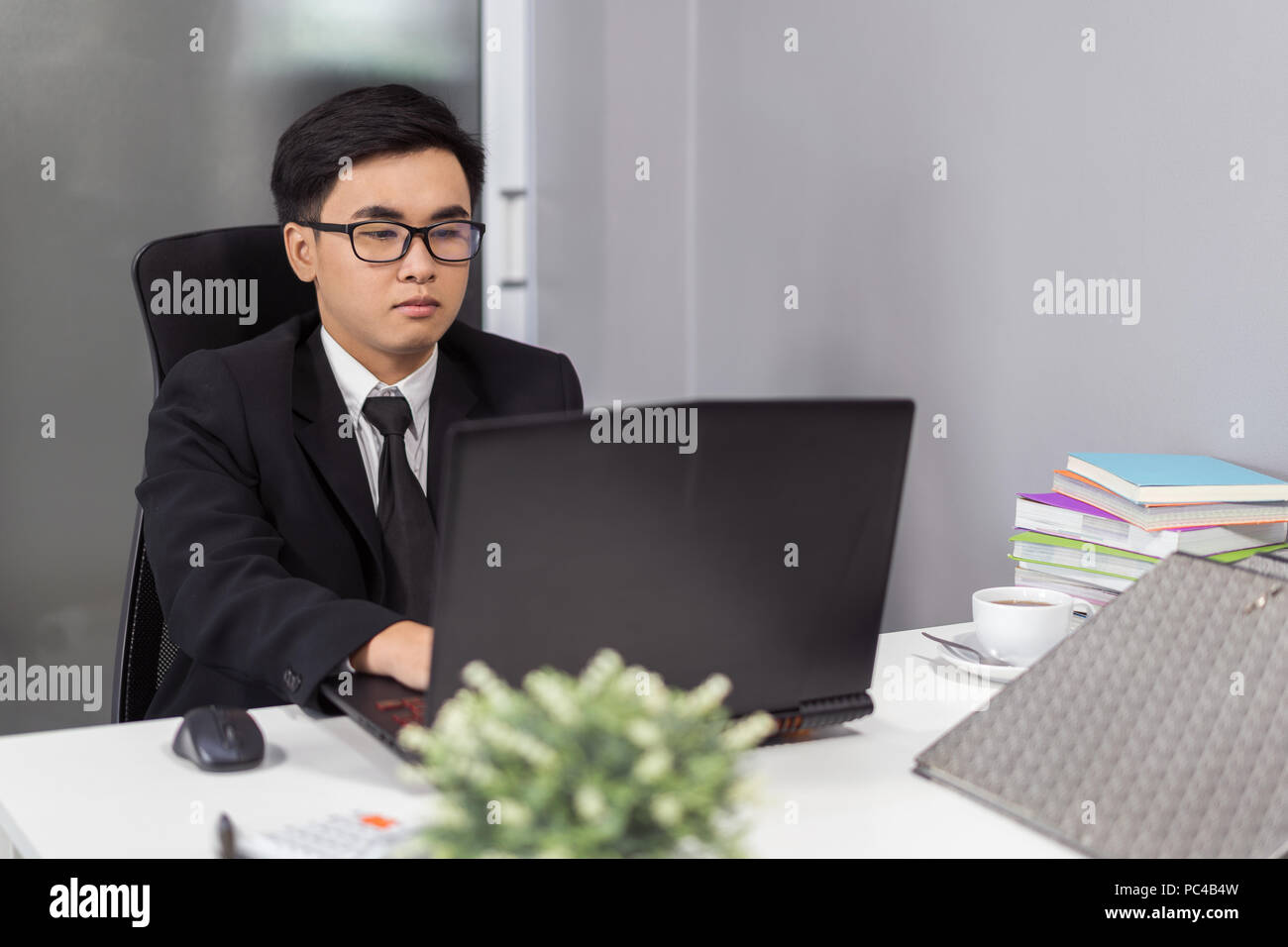 young business man using laptop computer Stock Photo