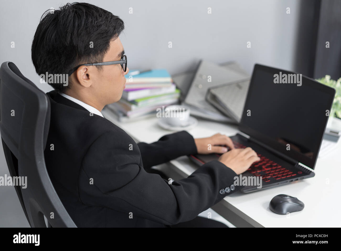 young business man using laptop computer Stock Photo
