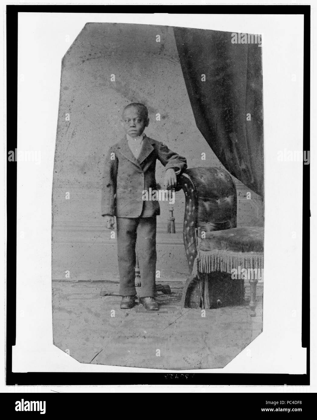 African American boy, full-length portrait, standing Stock Photo