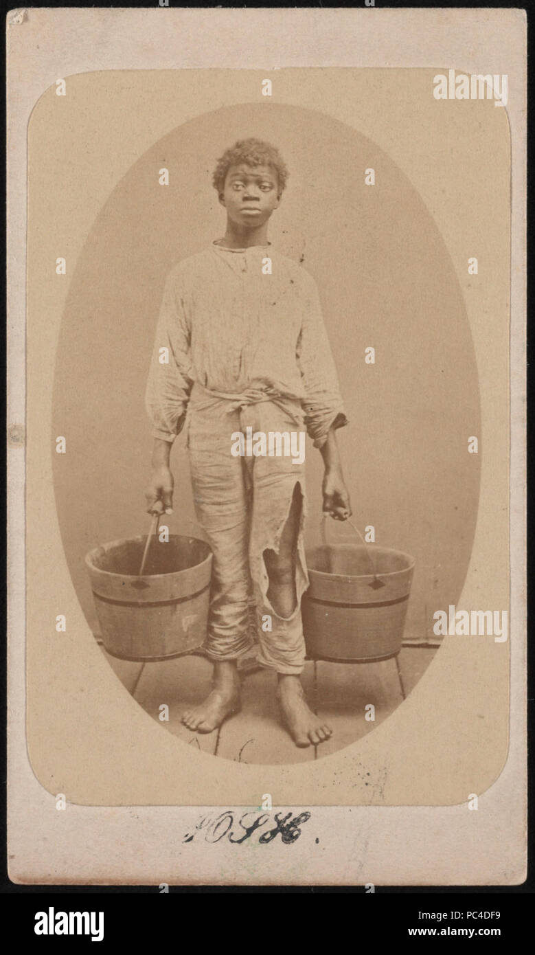 African American boy, possibly a slave, holding two buckets) - Isaac Haas, photographer & dealer in stereoscopic views, Green Cove Springs, Fla Stock Photo
