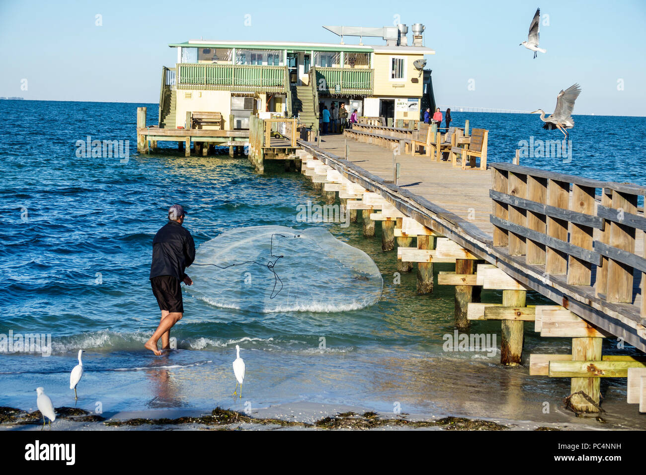 Rod and reel pier hi-res stock photography and images - Alamy