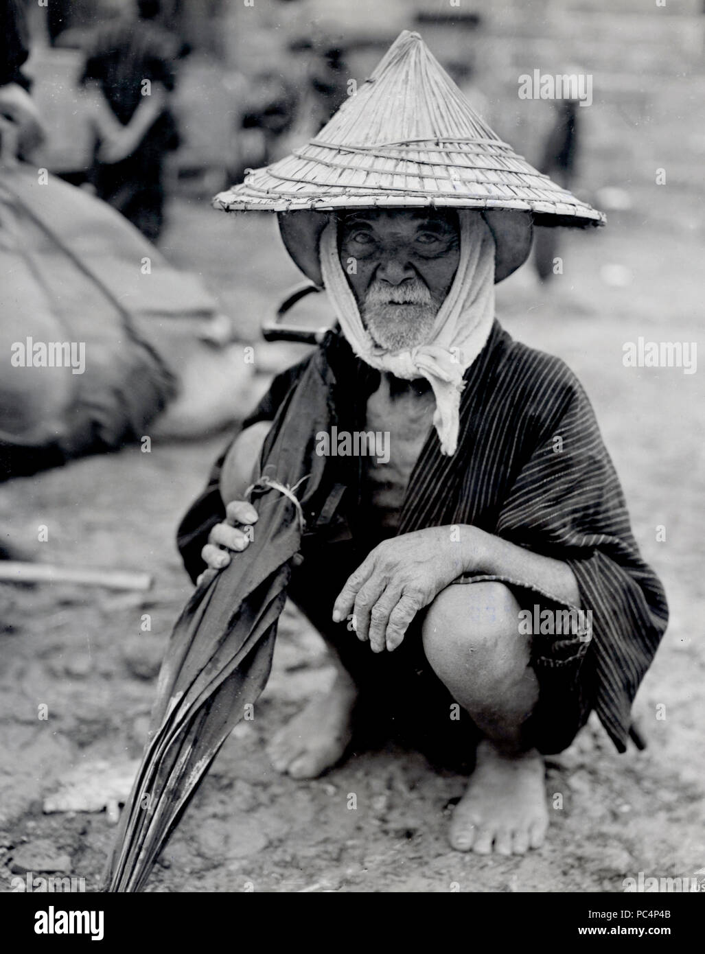 One of the oldest Okinawa natives taken care of by Marines during their invasion of Okinawa Stock Photo