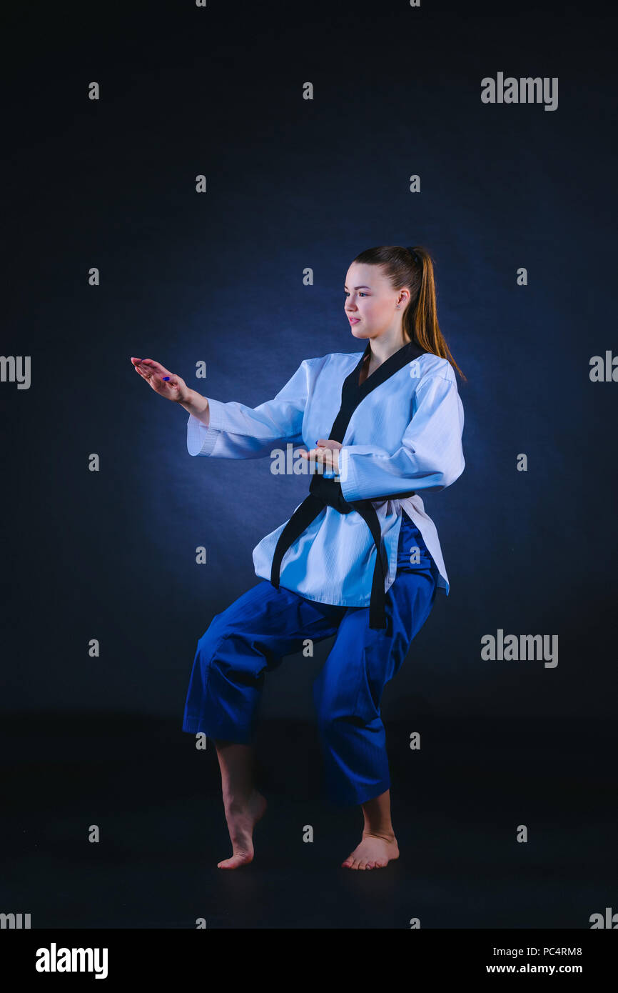The karate girl with black belt Stock Photo Alamy