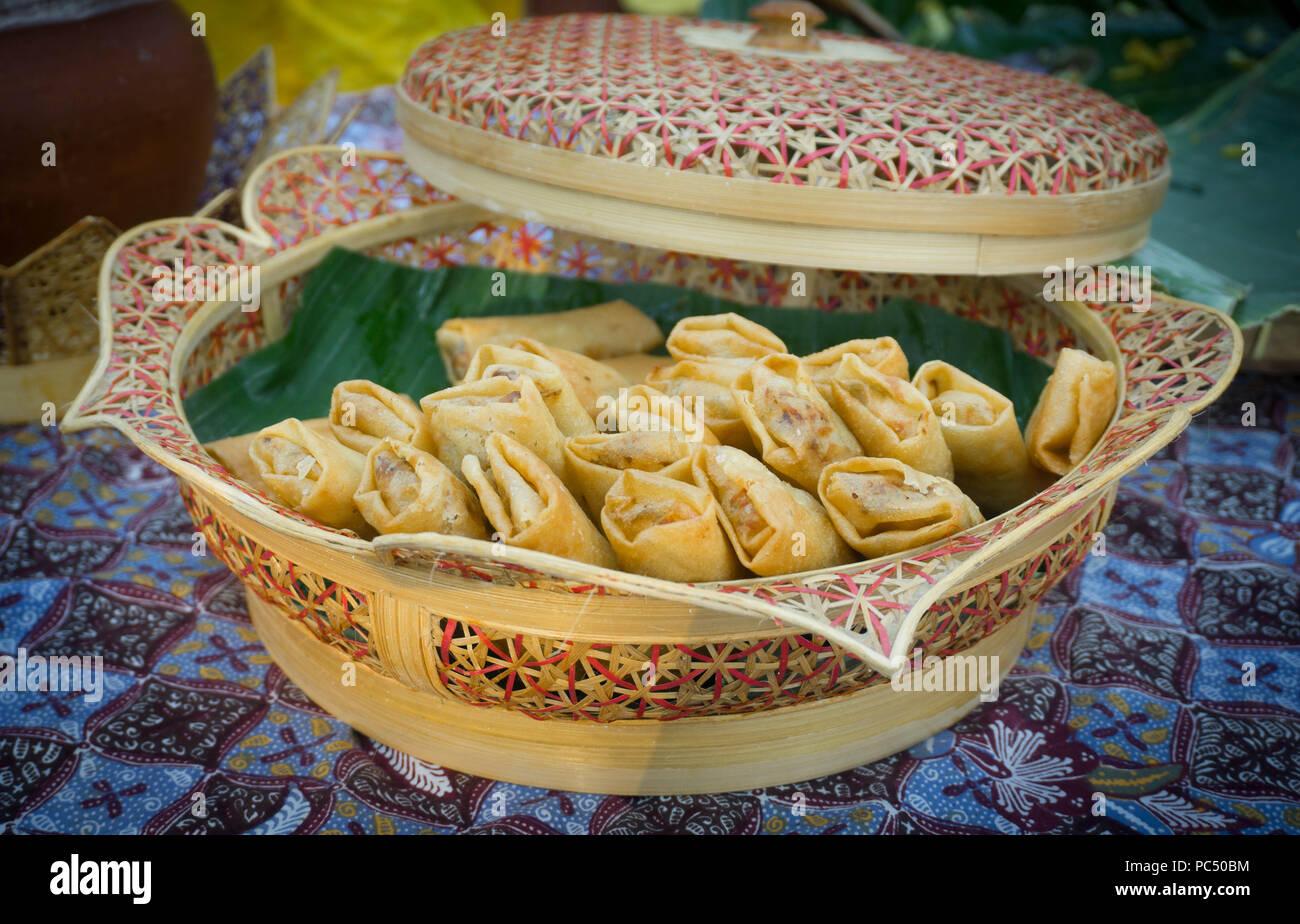 lumpia roll deep fried in wooden basket photo taken in central java indonesia Stock Photo