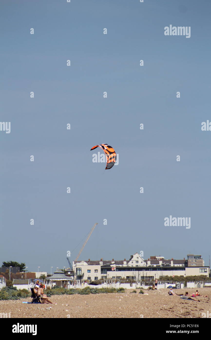 kite flying over goringbysea beach Stock Photo Alamy