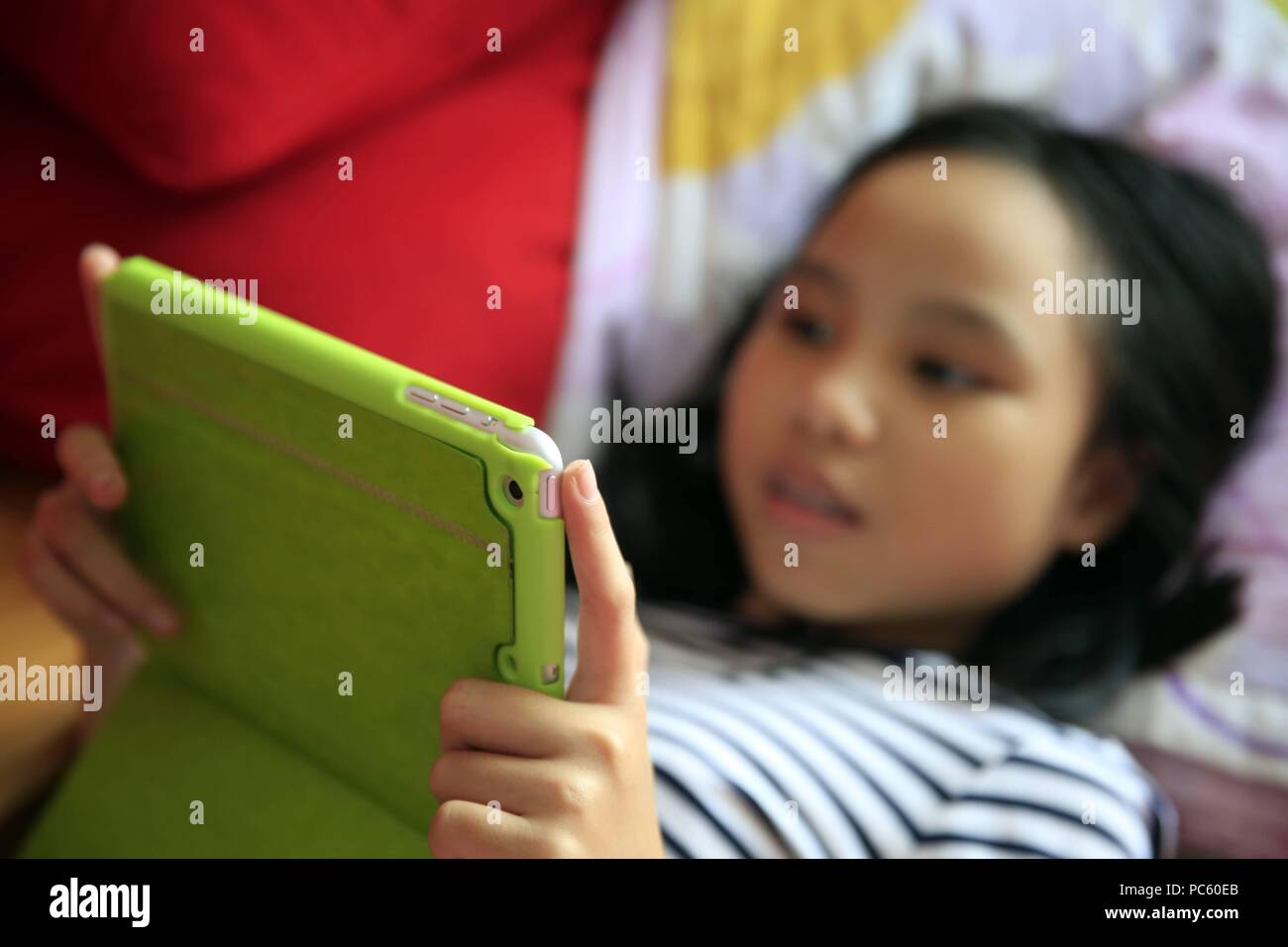 Girl Playing With Her Tablet During A Pokemon Go Gaming Usage Worldwide Stock Photo Alamy