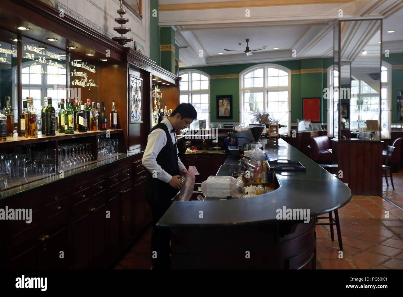 Old French-style Cafe de la Poste. The bar.  Dalat. Vietnam. | usage worldwide Stock Photo