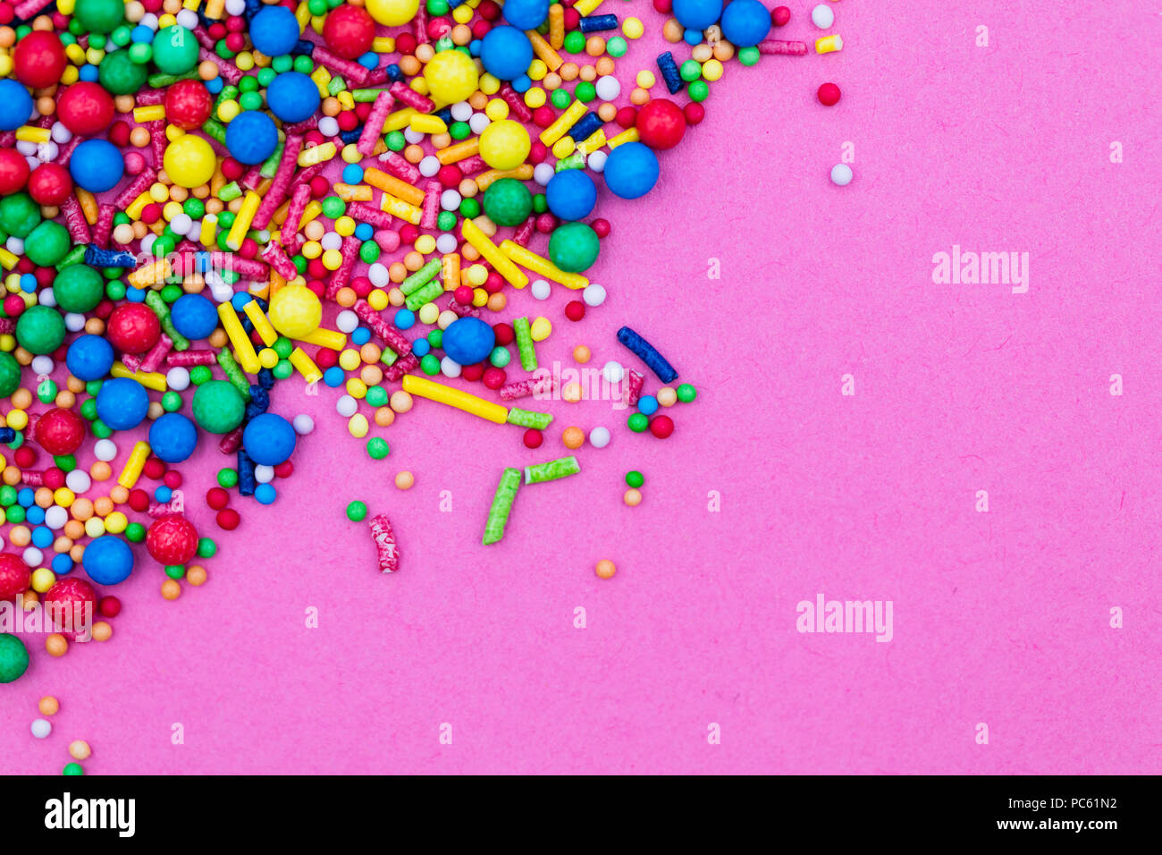Colourful candy cake decorative sprinkles background Stock Photo Alamy