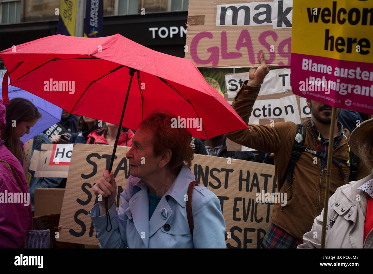 Glasgow, Scotland, on 31 July 2018. Rally in Buchanan Street, in support of refugees facing eviction by private housing company Serco. Serco announced this week that they would begin to evict asylum seekers who have had their application for refugee status rejected by the Home Office. Up to 300 refugees are facing imminent eviction. Image Credit: Jeremy Sutton-Hibbert/ Alamy News. Stock Photo