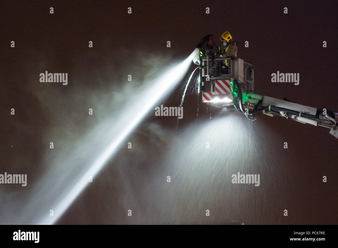 Glasgow, Scotland, UK - 31 July 2018: firefighters working into the night at the derelict old Stobhill Hospital, Glasgow, after a fire broke out earlier in the day Credit: Kay Roxby/Alamy Live News Stock Photo