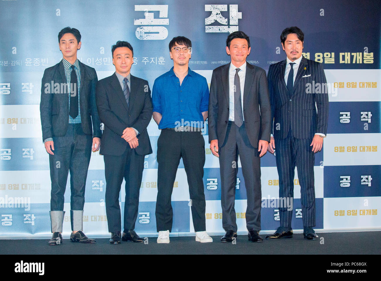 Ju Ji-Hoon, Lee Sung-Min, Yoon Jong-Bin, Hwang Jung-Min and Cho Jin-Woong, July 31, 2018 : South Korean film director Yoon Jong-Bin (C) poses with cast members Ju Ji-Hoon (L), Lee Sung-Min (2nd L), Hwang Jung-Min (2nd R) and Cho Jin-Woong (R) at a press conference for their new film 'The Spy Gone North' at a theatre in Seoul, South Korea. The spy film tells the story of a South Korean spy who goes undercover as a businessman in North Korea in the 1990s to infiltrate North's nuclear facilities using the codename 'Black Venus'. Credit: Lee Jae-Won/AFLO/Alamy Live News Stock Photo