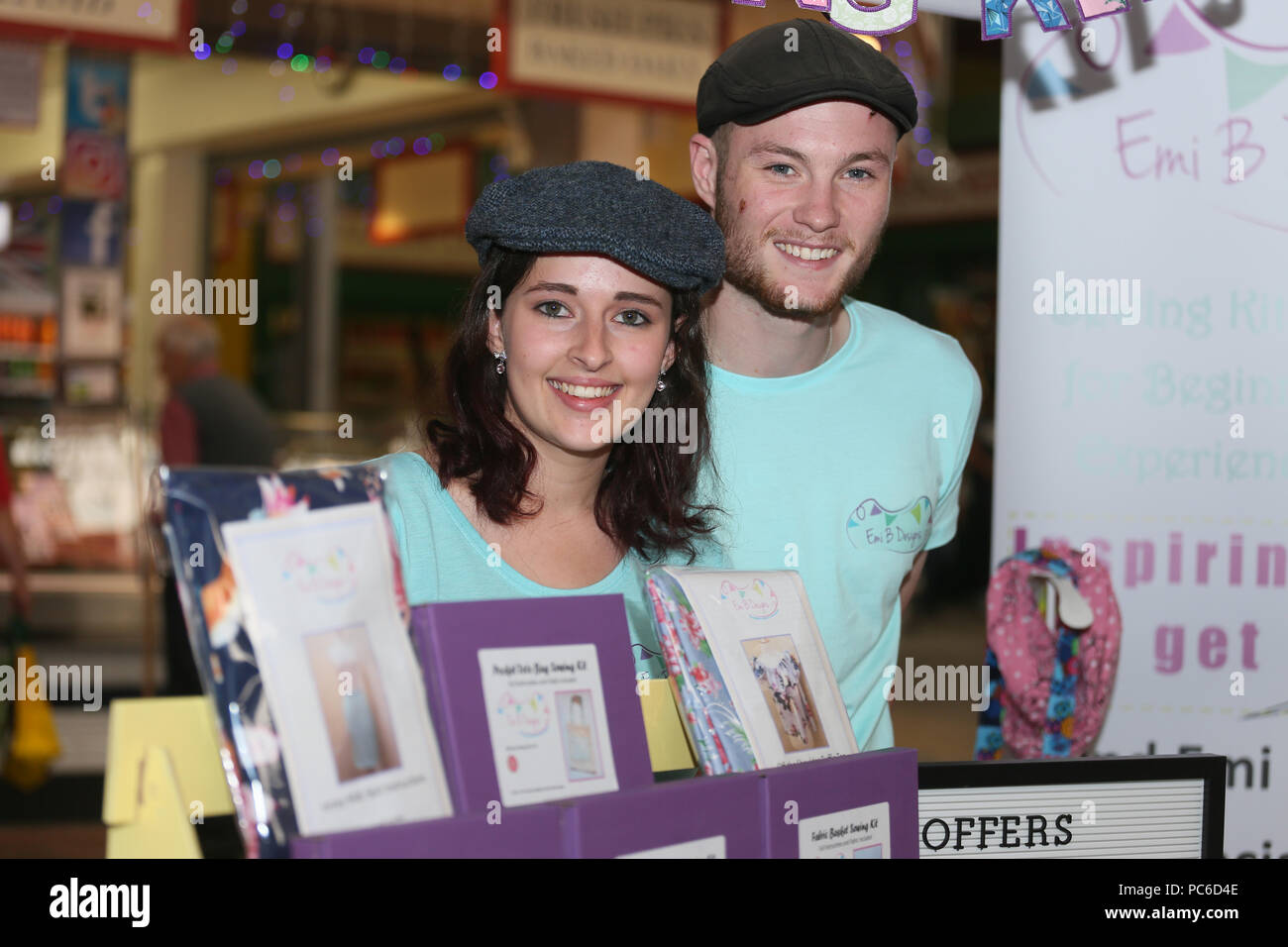 Leeds, UK. 1st August 2018. Young market stall holders join attempt to