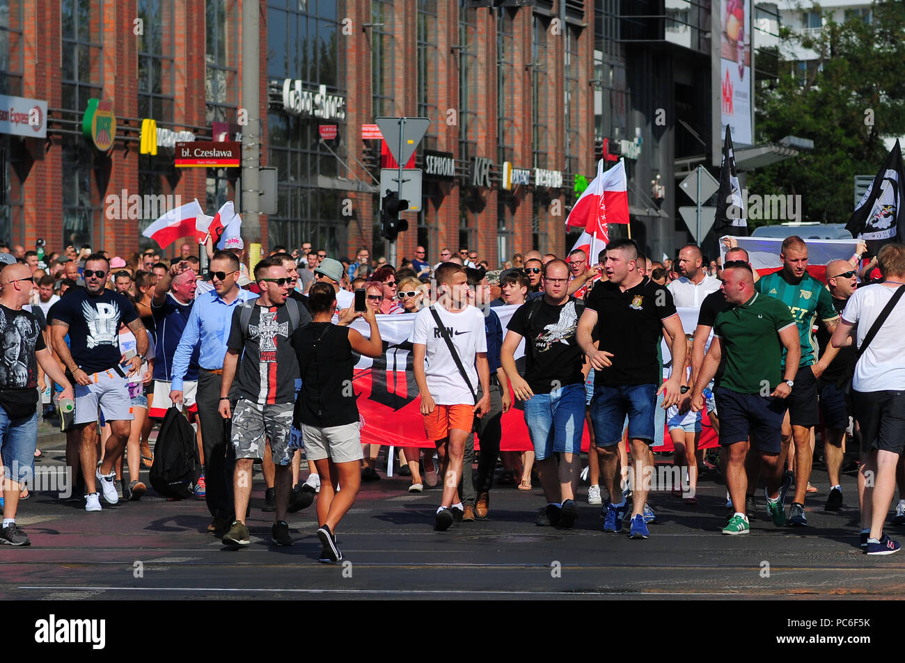 Wroclaw, Poland. August 1st, 2018. The people of Wroclaw, Poland march through the city on August 1, 2018 as they commemorate the 74nd anniversary of the Warsaw Uprising. The 1944 revolt saw thousands rise against the Nazi occupation in an effort to take back their city. Stock Photo