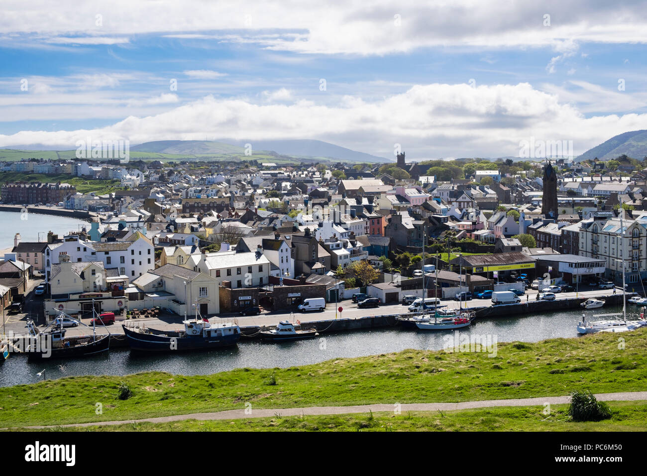 Overview across the harbour to the town rooftops from Peel Hill. Peel, Isle of Man, British Isles Stock Photo