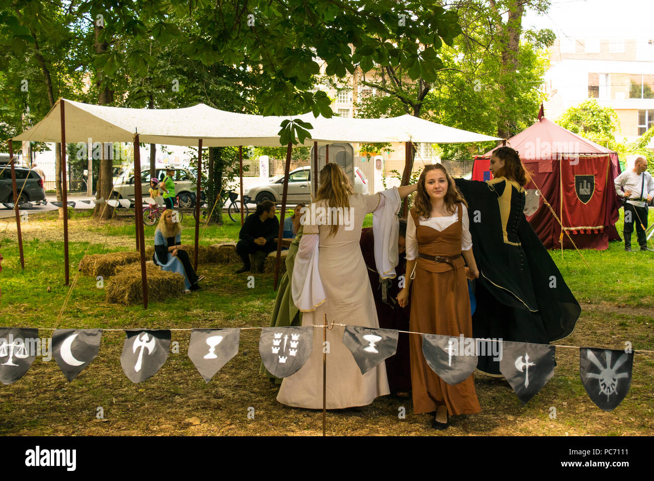 Ploiesti, Romania - July 14, 2018: Dressed up ladies reproduce old medieval dance in outdoor scene at The Medieval Festival held in Ploiesti, Prahova, Stock Photo