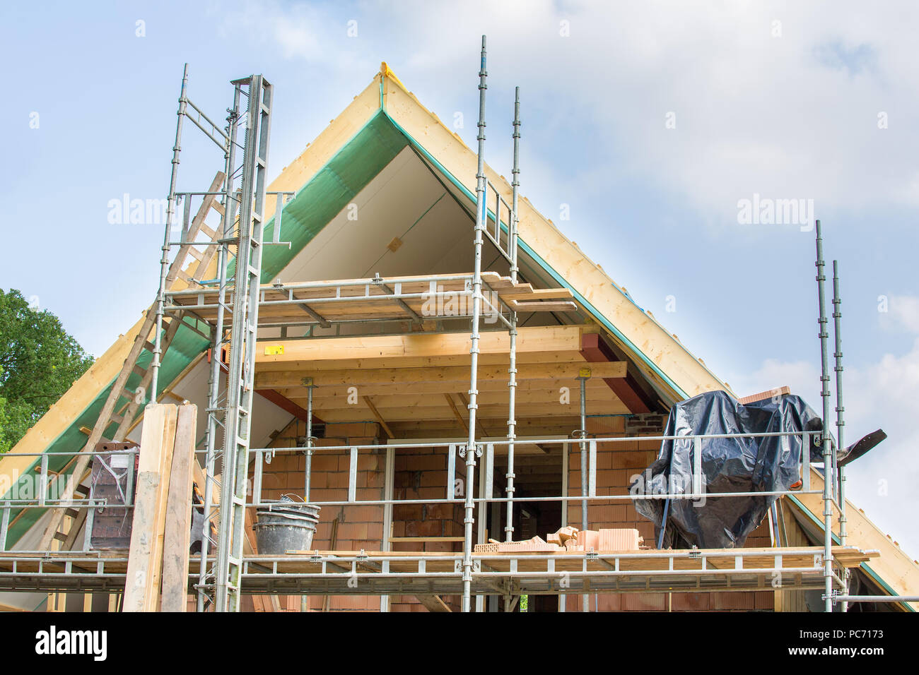 Gabled roof of new house as construction site with air Stock Photo
