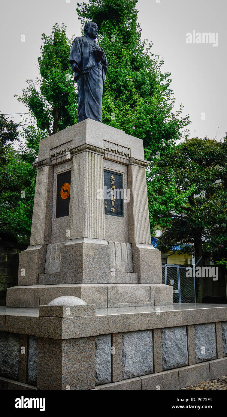 Tokyo, Japan - Jul 18, 2015. Statue of Oishi Kuranosuke, the leader of 47 loyal ronin, one of the most popular Japanese historical stories at Sengakuj Stock Photo