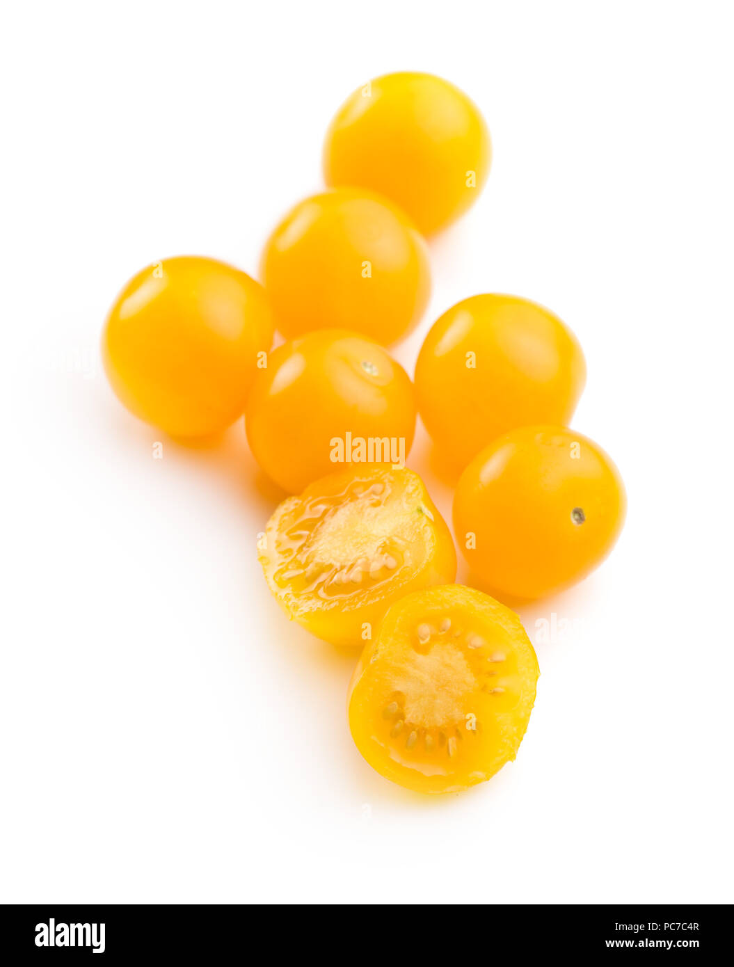 Yellow cherry tomatoes isolated on white background. Stock Photo