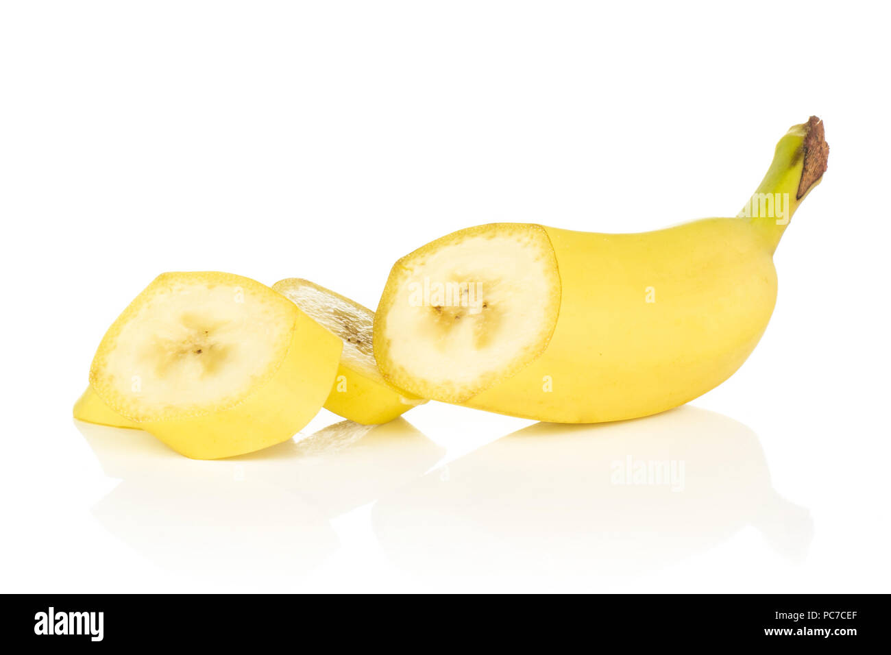 Group of one half three slices of fresh yellow banana isolated on white ...