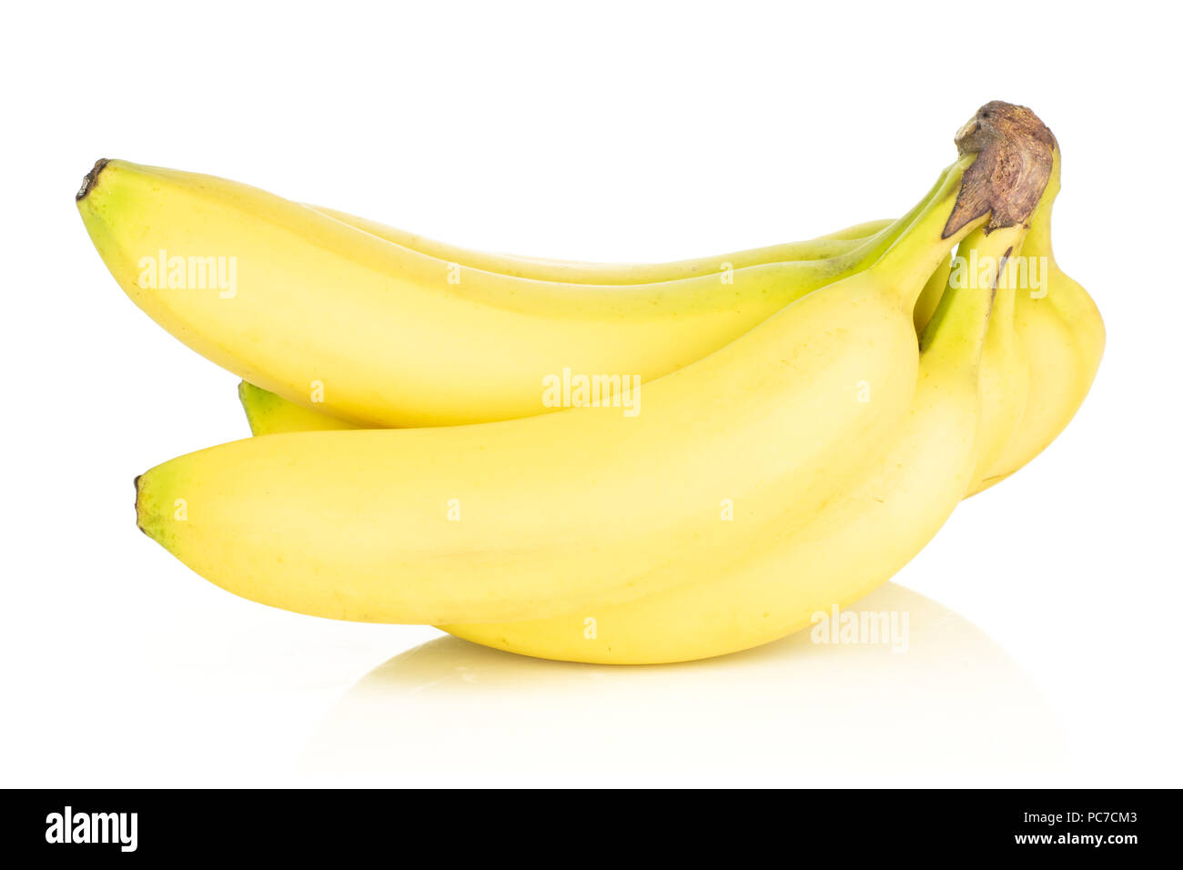 Group of five whole fresh yellow banana one cluster side view isolated on white background Stock Photo