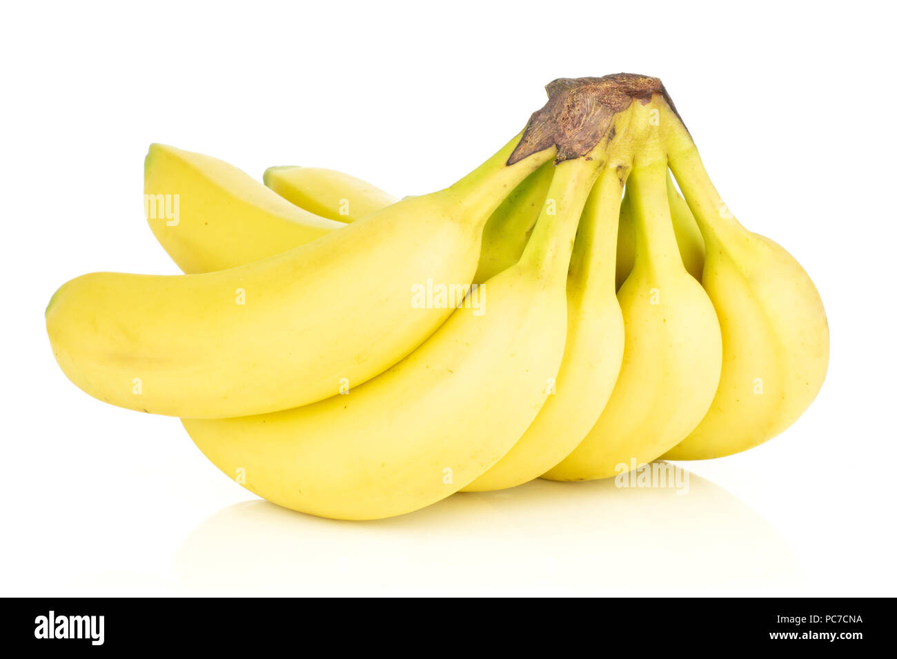 Group of eight whole fresh yellow banana one cluster isolated on white background Stock Photo