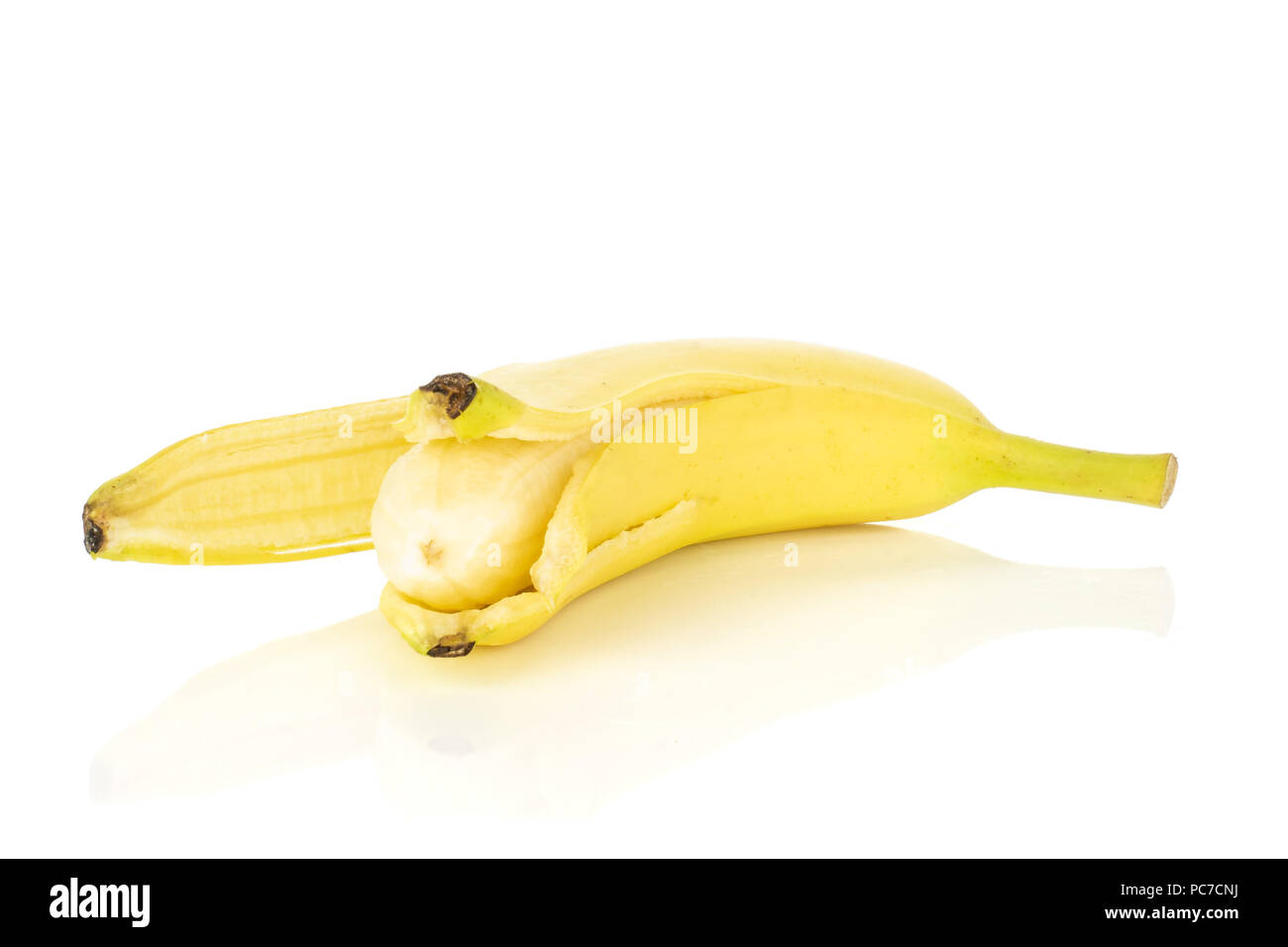 One whole open fresh yellow banana isolated on white background Stock Photo