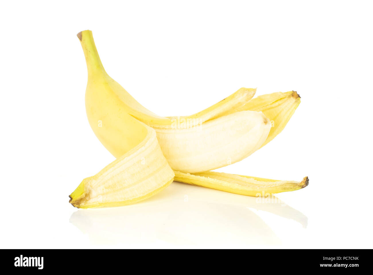 One whole opened fresh yellow banana isolated on white background Stock Photo