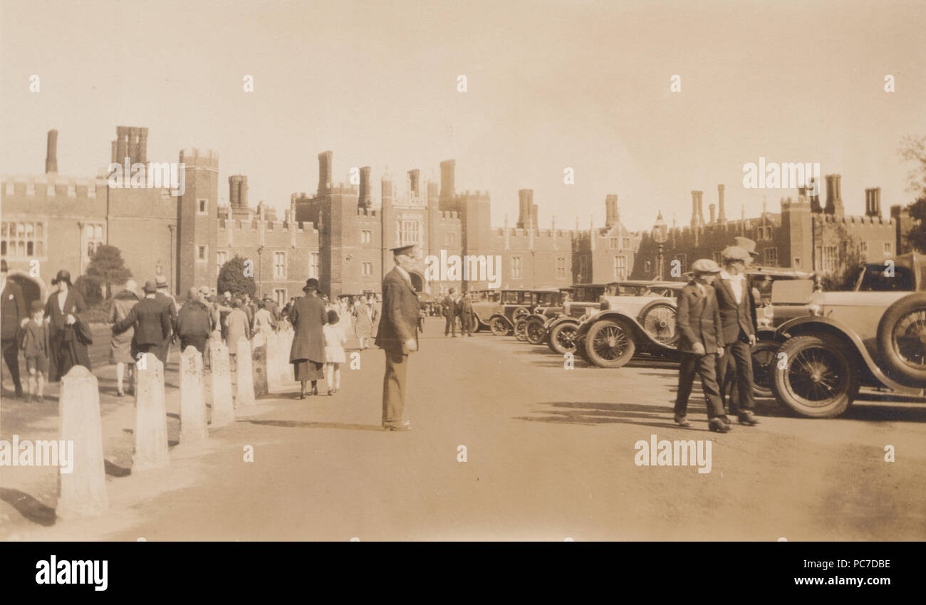 Vintage Photograph of Vintage Cars Lined up at The Entrance To Hampton Court Palace,  Richmond upon Thames. Stock Photo
