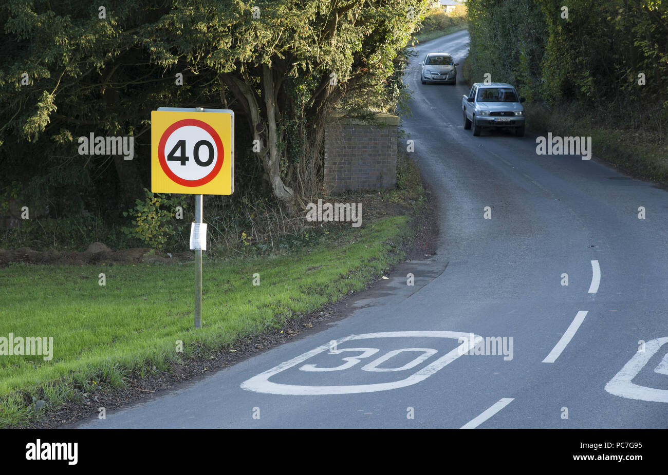Confusing road speed signs at Middleton, Ludlow, Shropshire Stock Photo ...