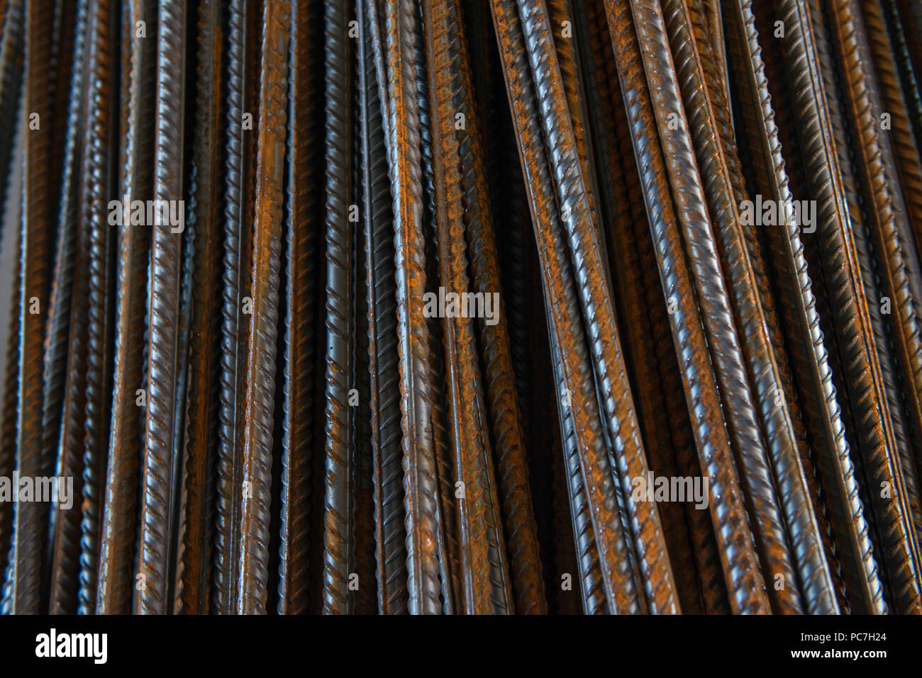 rusty metal bars for construction works. building background Stock