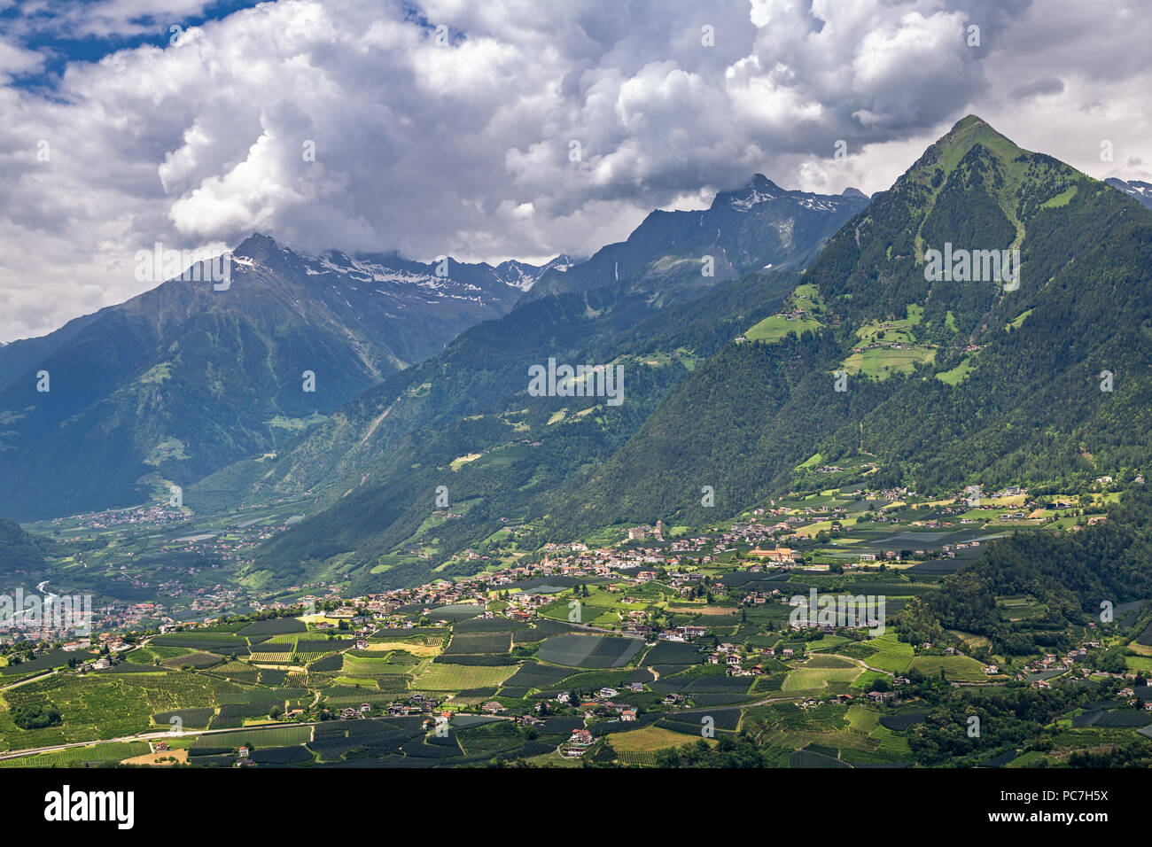 View from the Scena Waalweg path to Tyrol village and the Vinschgau above Schenna near Meran, South Tyrol Stock Photo