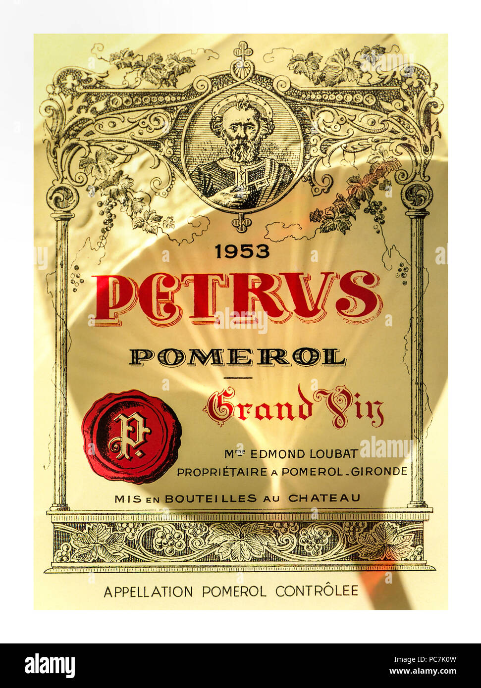CHATEAU PETRUS wine tasting concept glass swirling falling on label of rare fine luxury1953 Pétrus Pomerol Grand Vin red wine Bordeaux France Stock Photo