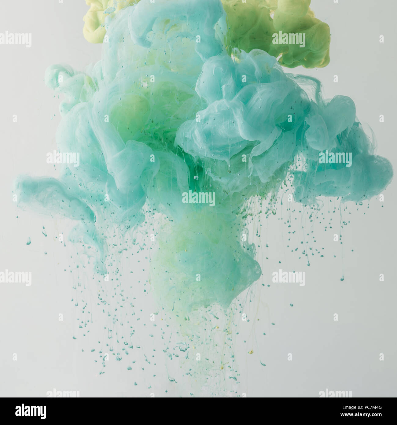 artistic background with turquoise paint flowing in water, isolated on ...