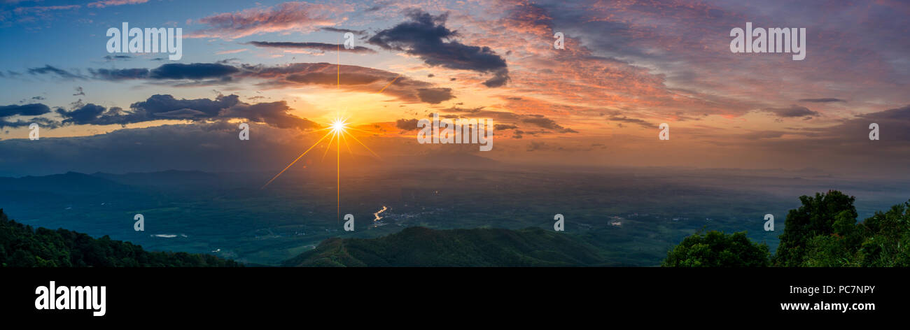 Mountain panorama photo Morning sun Thailand View on the top of the hill with beautiful sunsets. Nakhon Si Thammarat Chawang District Stock Photo