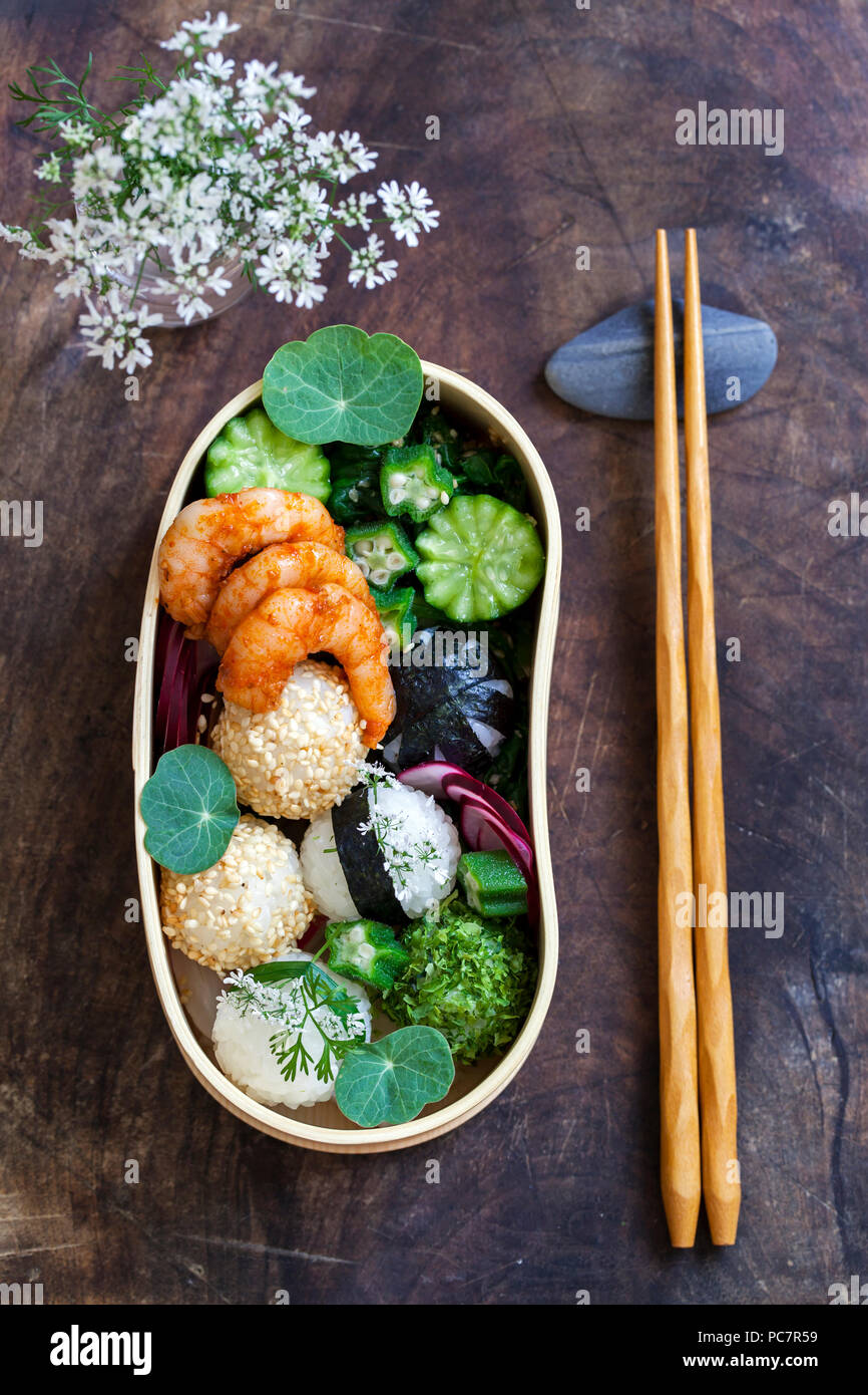 Bento box with onigiri, prawns and vegetables Stock Photo Alamy