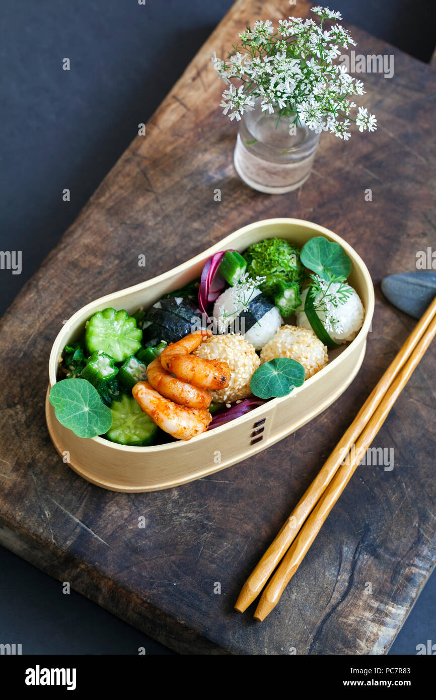 Bento box with onigiri, prawns and vegetables Stock Photo Alamy