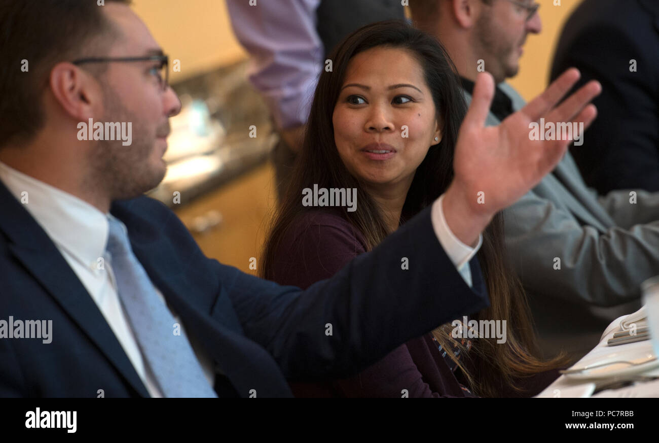 UNITED STATES: July 31, 2018: Owen Donnelly and Angie Koulavong talk during the next Gen luncheon at the 2941 Restaurant in Arlington Virginia. The ne Stock Photo