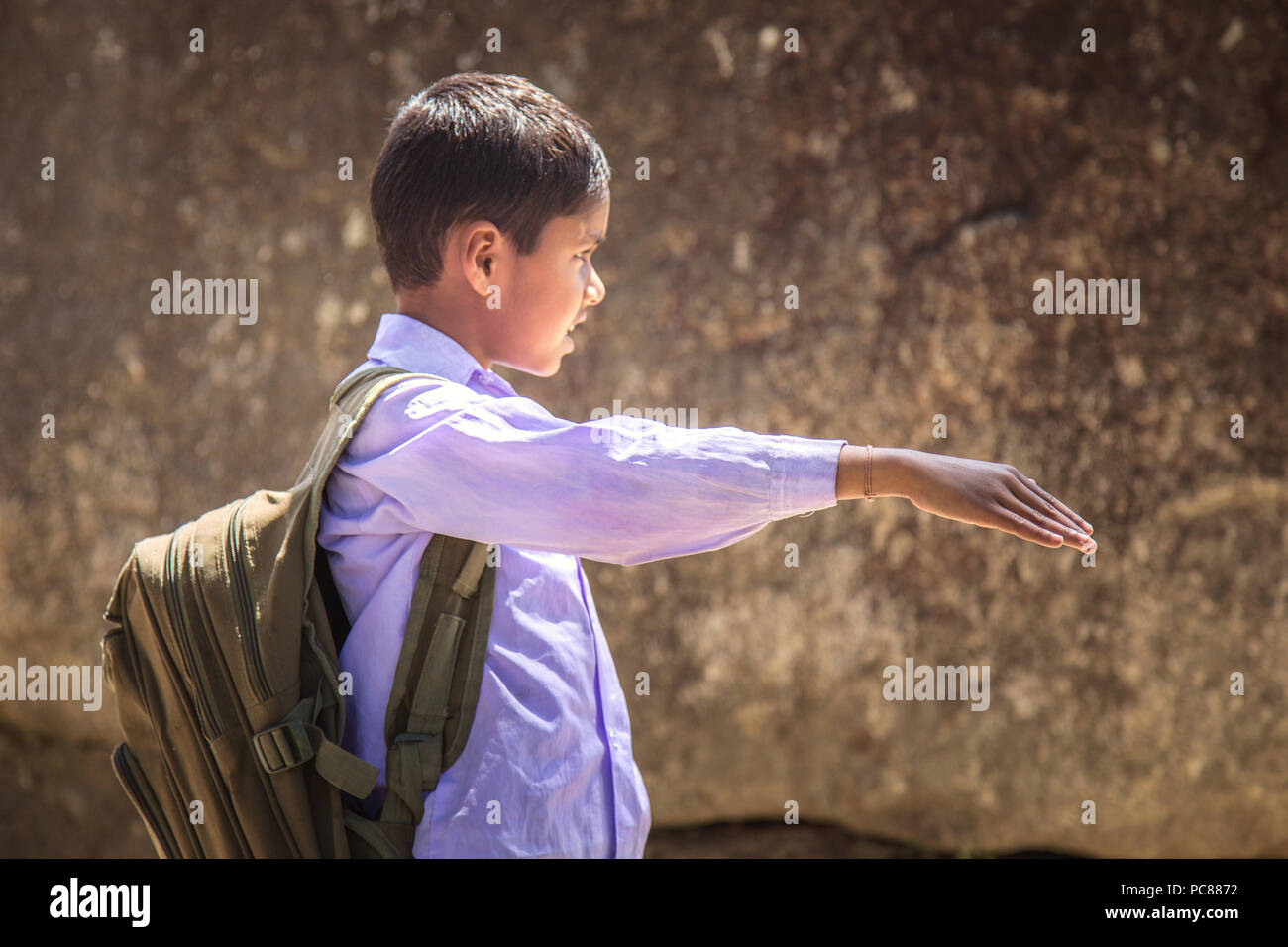 Rural Indian village school student leading morning assembly. Stock Photo
