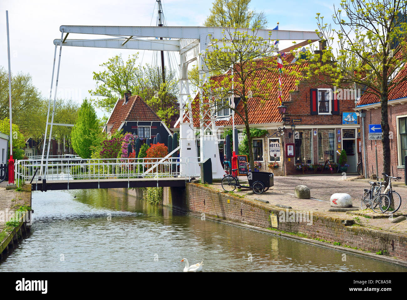 Vertical lift bridge in the  pretty Dutch small town of Edam well known for its cheese making, Holland, The Netherlands Stock Photo