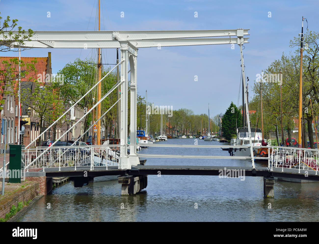 Vertical lift bridge in the  pretty Dutch small town of Edam well known for its cheese making Stock Photo