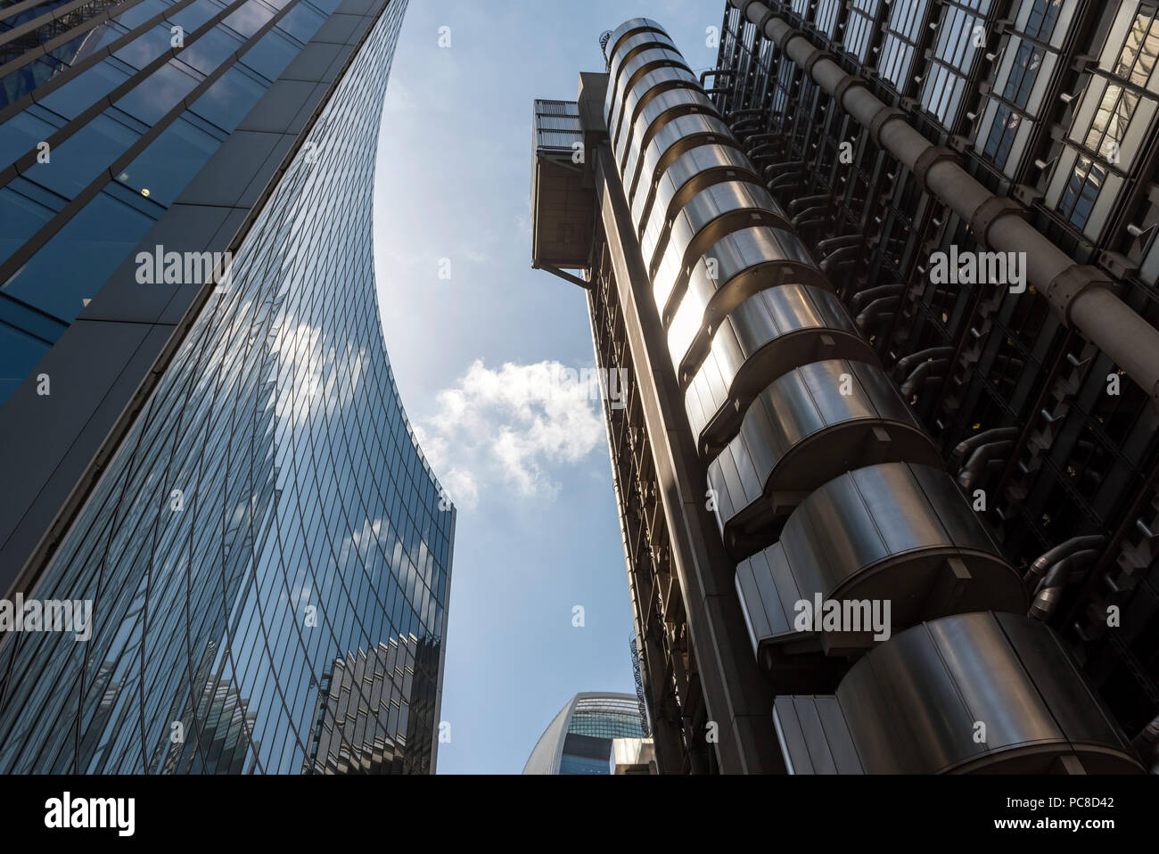 Low-angle view of Willis and Lloyd's (Inside-Out) Buildings at Lime Street, City of London, England, UK Stock Photo