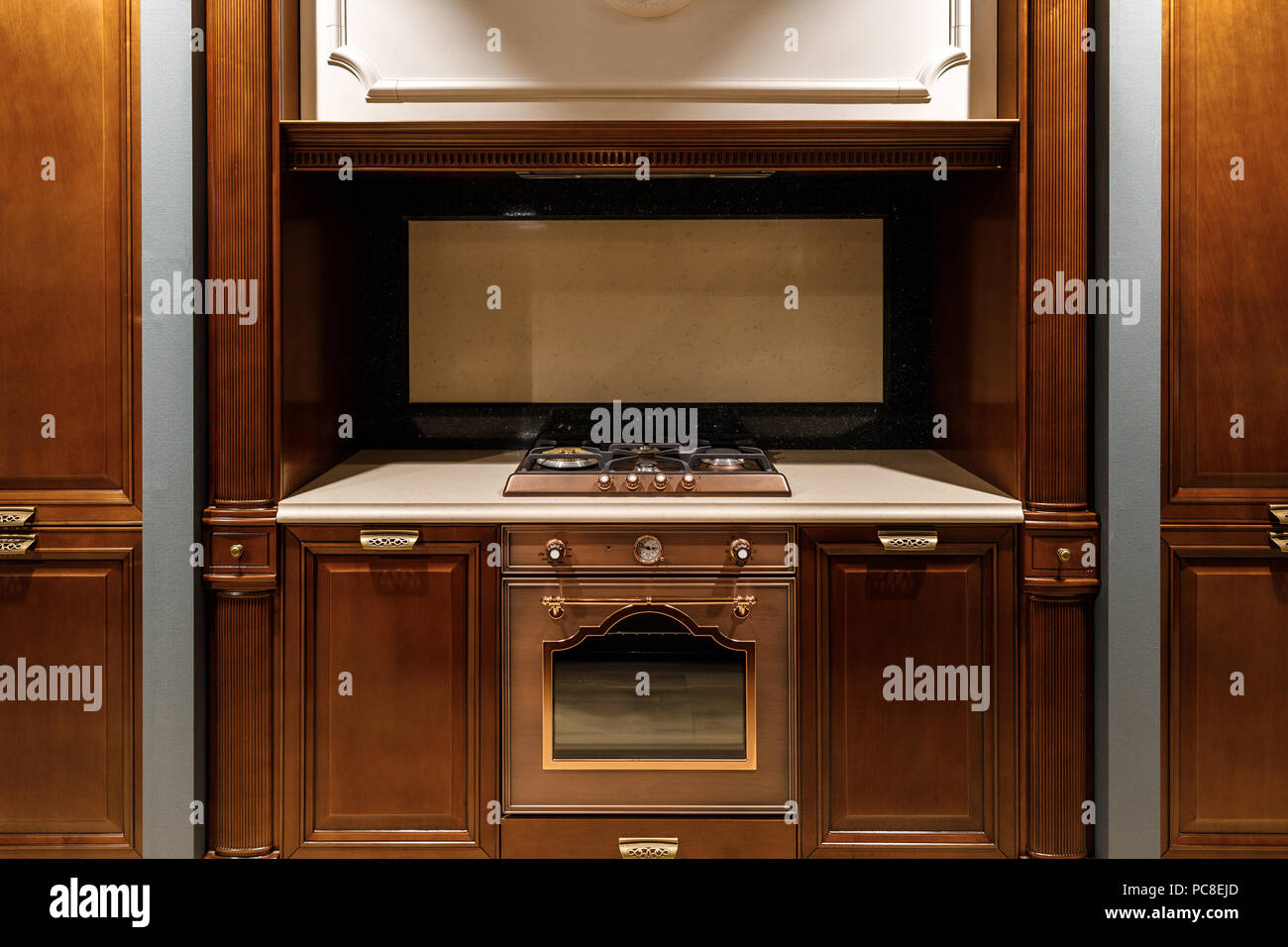 Interior of modern kitchen with stove and oven Stock Photo Alamy