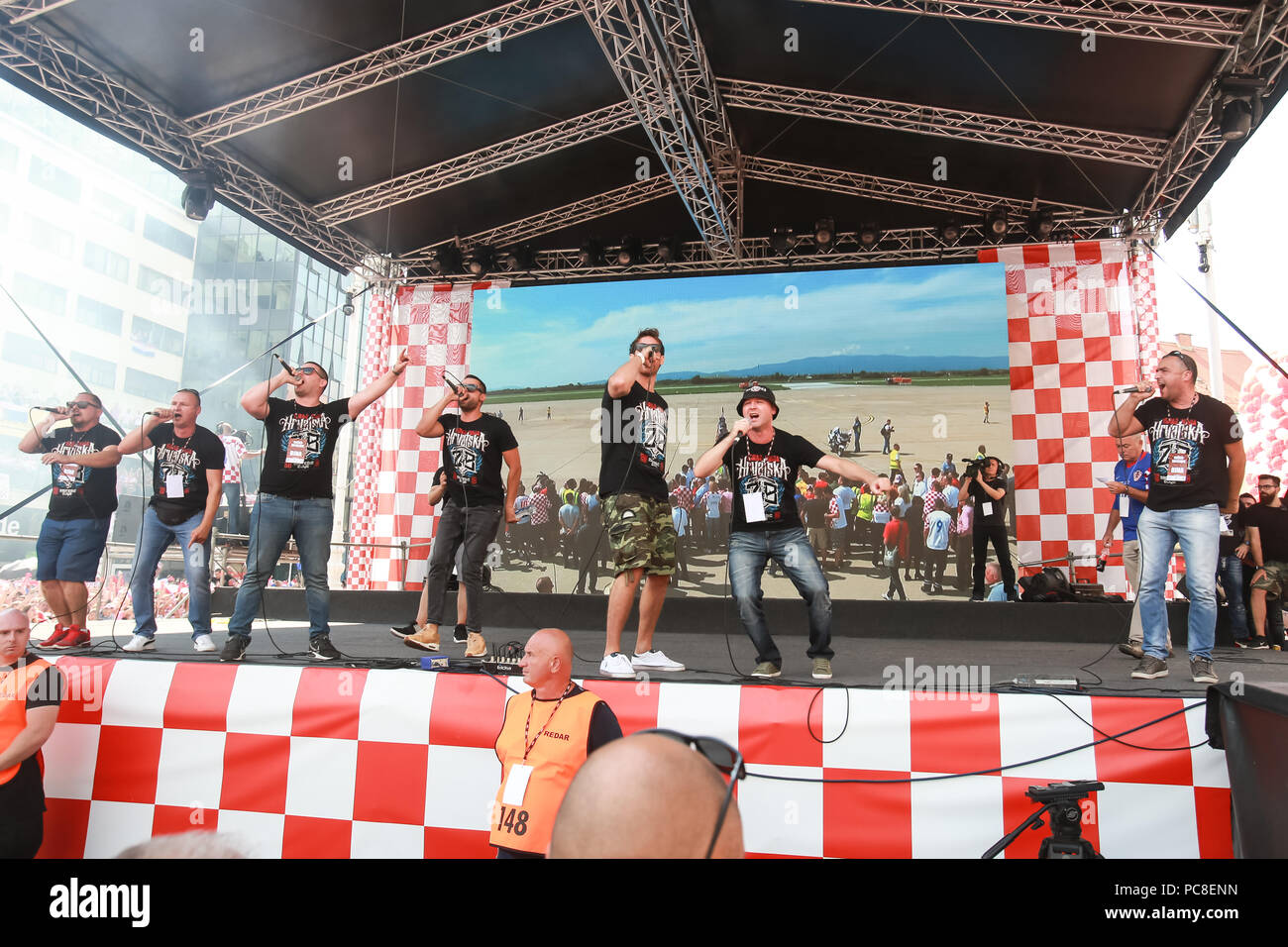 ZAGREB, CROATIA - JULY 16, 2018 : Croatia National Football Team welcome home celebration. Zapresic boys fan band singing on the stage. Stock Photo