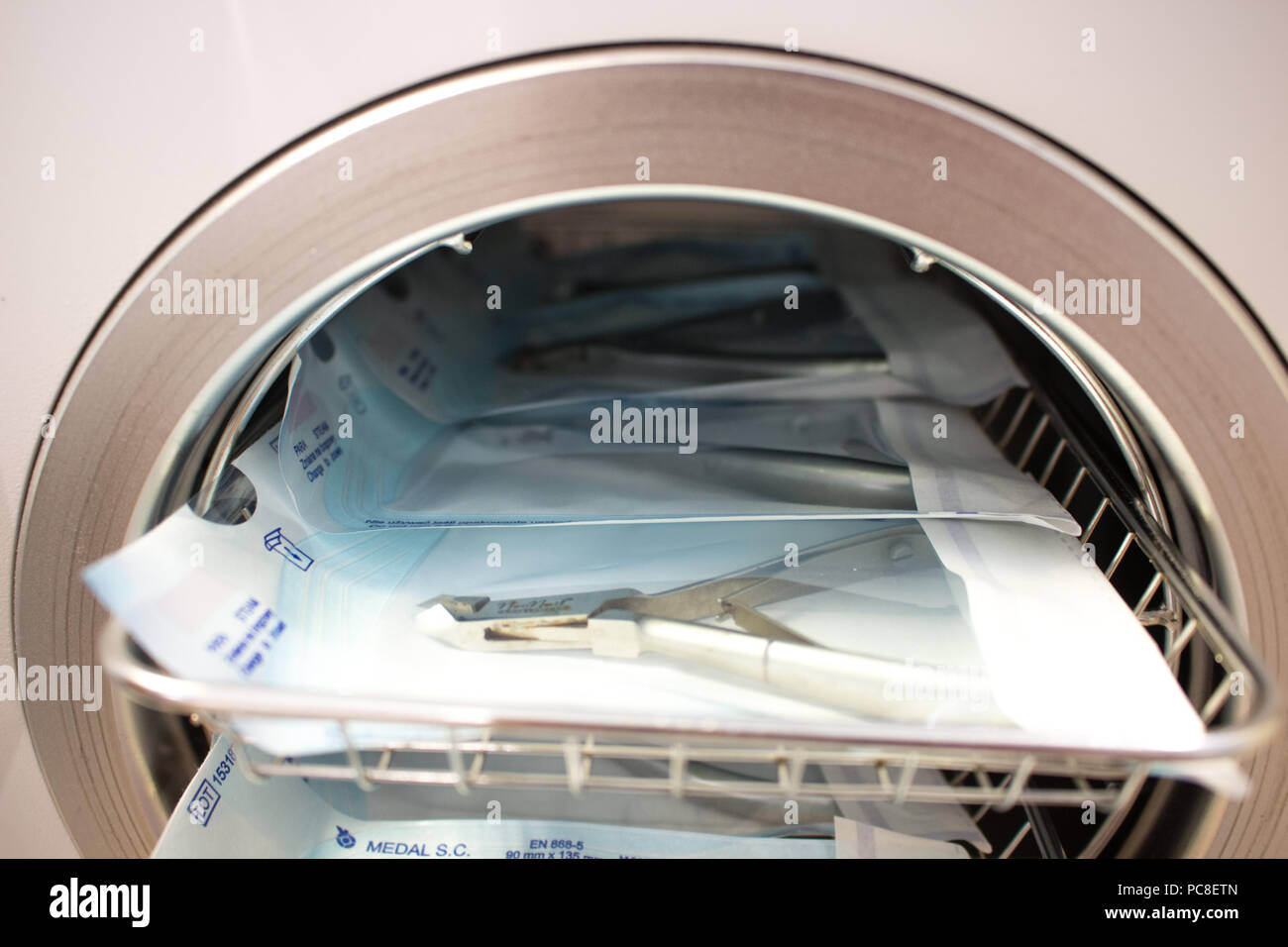 Sterilizing medical instruments in autoclave. Equipment for sterile