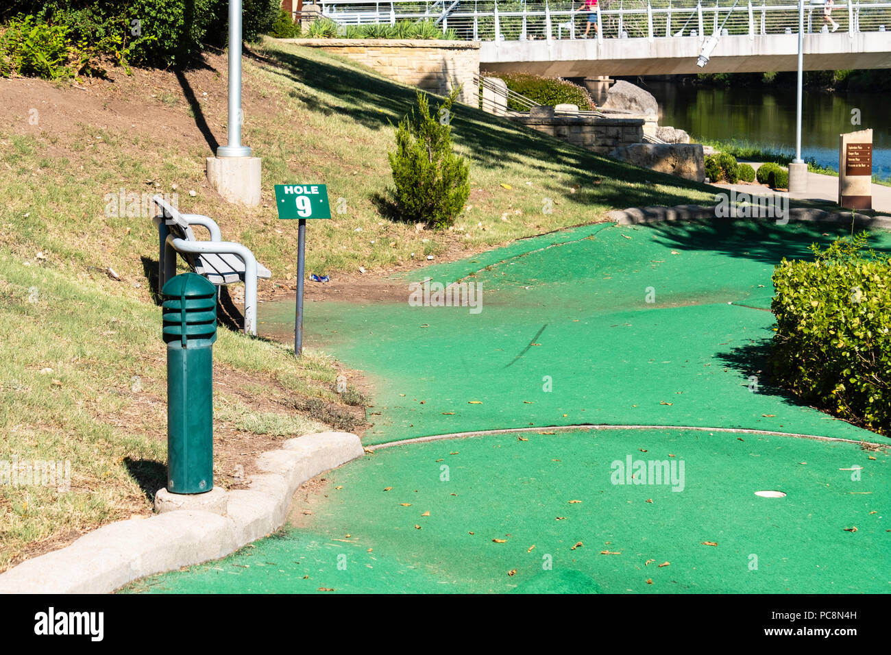 An unkept minature golf course next to the Arkansas river in Wichita, Kansas, USA. Stock Photo