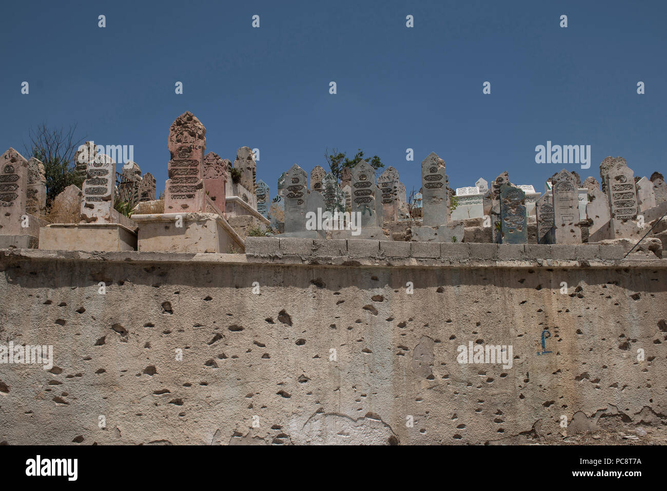 A Cemetery  damaged in old Aleppo in 2017 in war Stock Photo