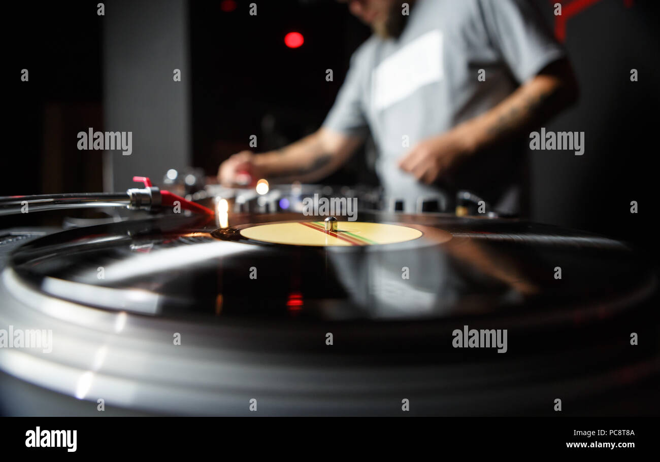 Professional dj turntable records player in close up. Disc jockey