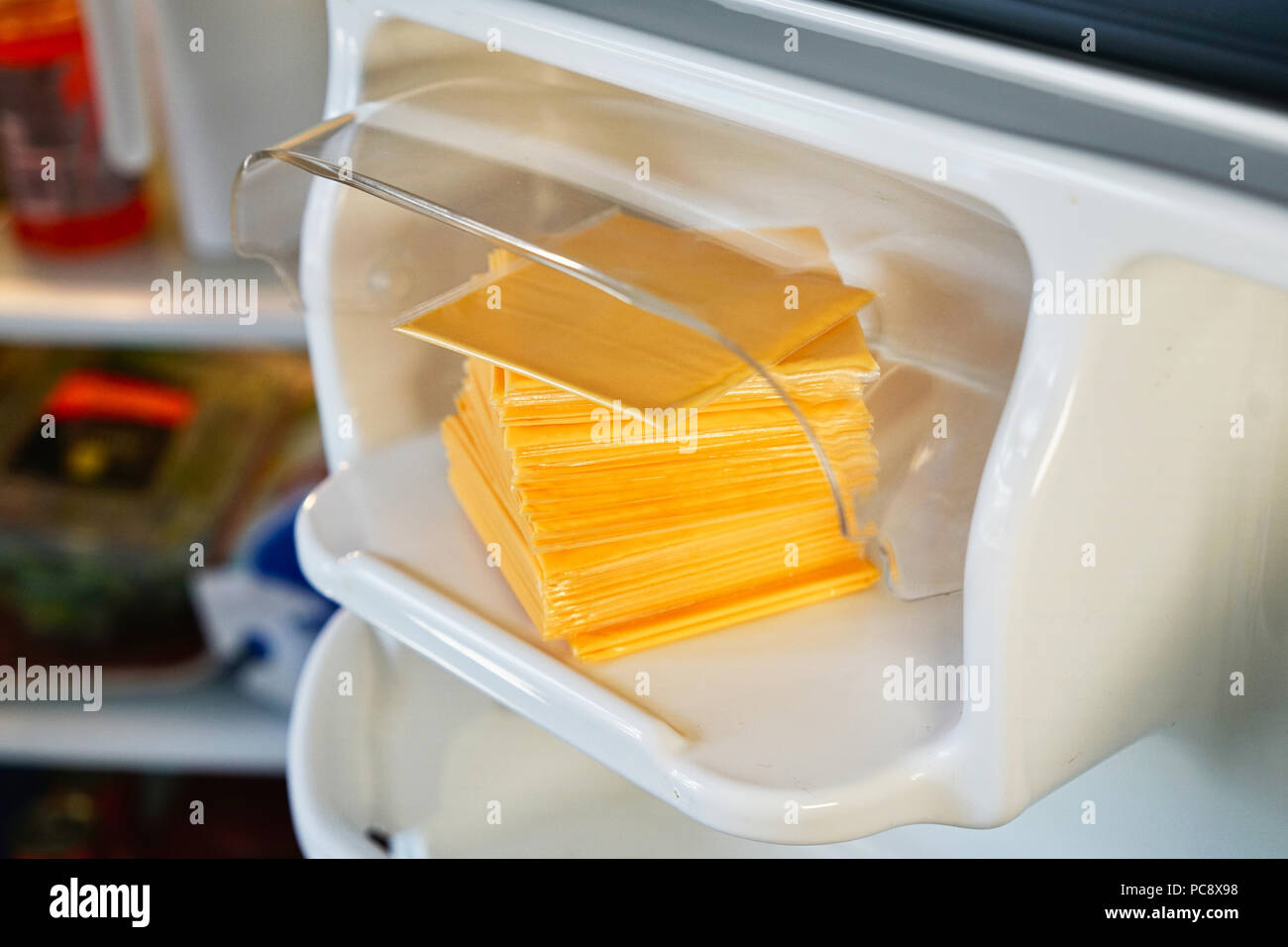 Montreal, Canada, July 31, 2018.Stack of processed cheese slices in refrigerator door.Credit Mario Beauregard/Alamy Live News Stock Photo