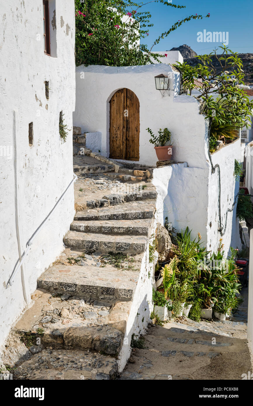 This is a picture of steps leading through the villiage of Lindos on ...